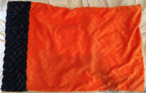 Zig Zag Zebra Print Pillowcase with Navy Rosette Trim and Embossed Orange Chevron Back